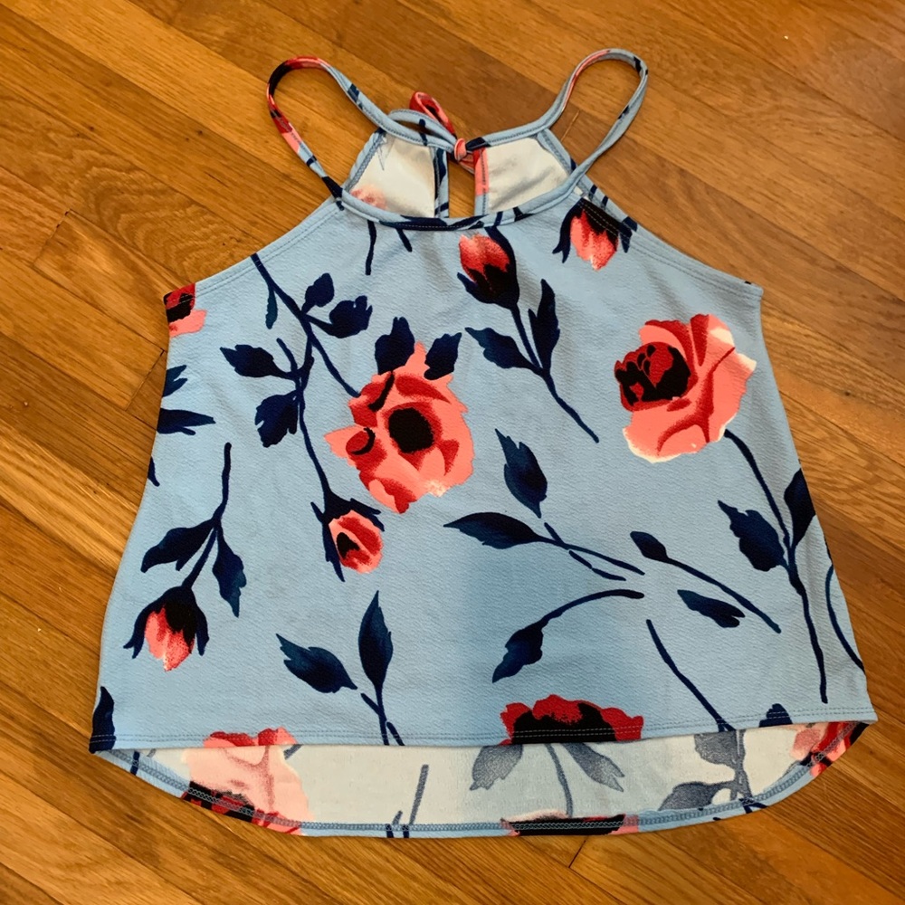 Three floral blouses